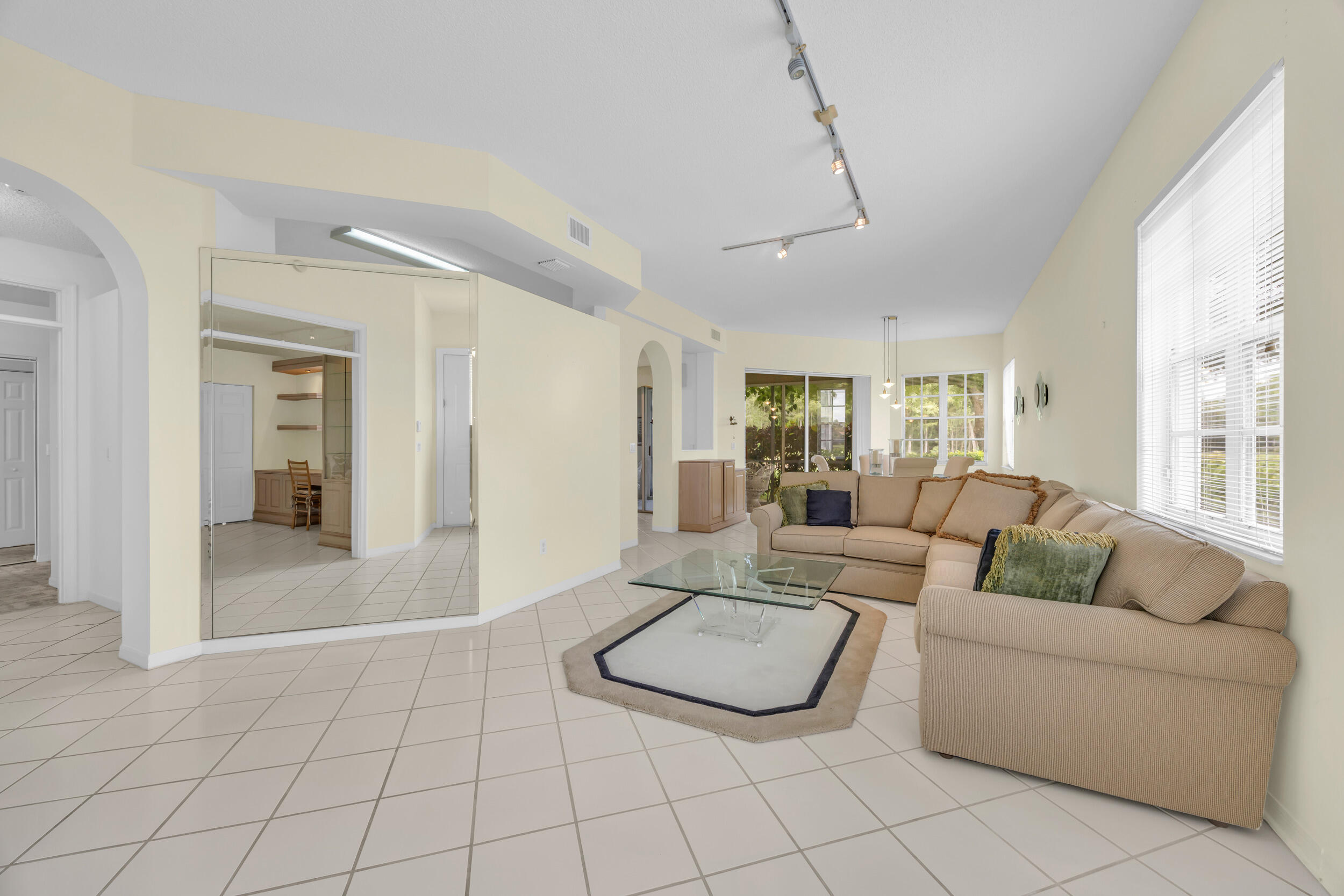 10172 Andover Coach Circle, Unit G2 Lake Worth, FL 33449 - Photo 9 of 64 a living room with furniture and a table