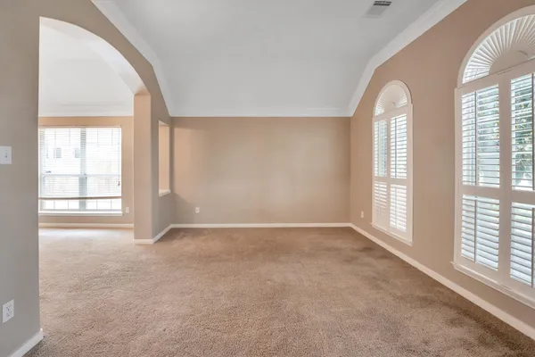 an empty room with windows