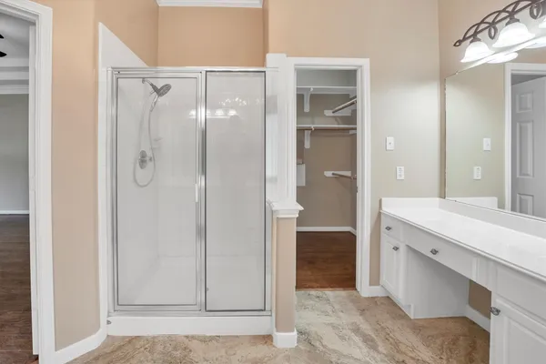 a view of a house with backyard porch and sitting area