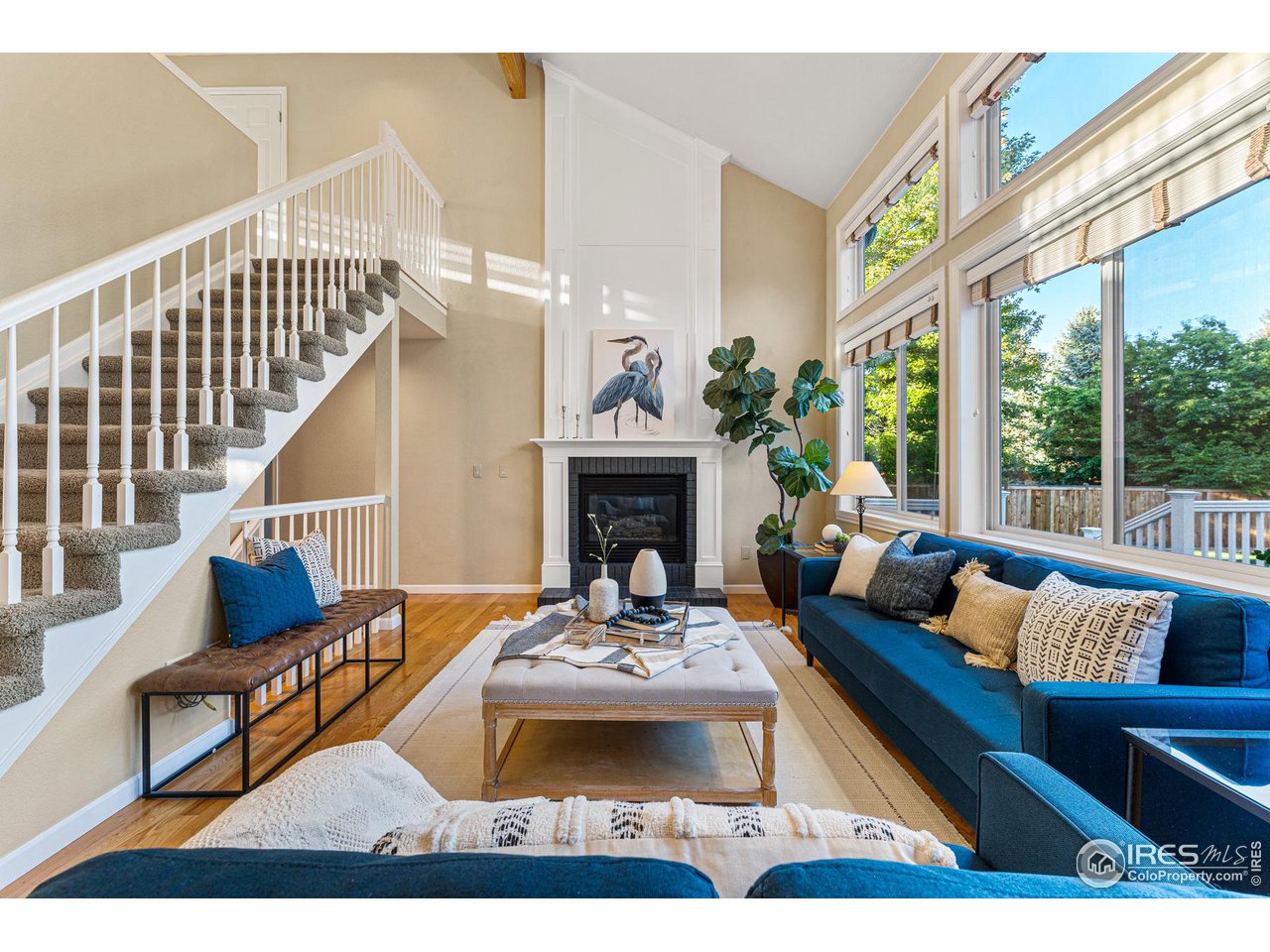 7452 Augusta Drive Boulder, CO 80301 - Photo 12 of 40 a living room with furniture and a fireplace