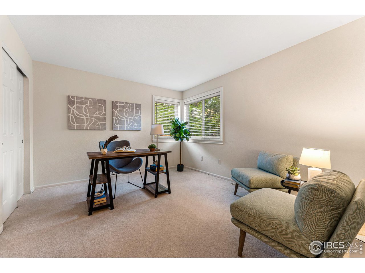 7452 Augusta Drive Boulder, CO 80301 - Photo 18 of 40 a living room with furniture and a window