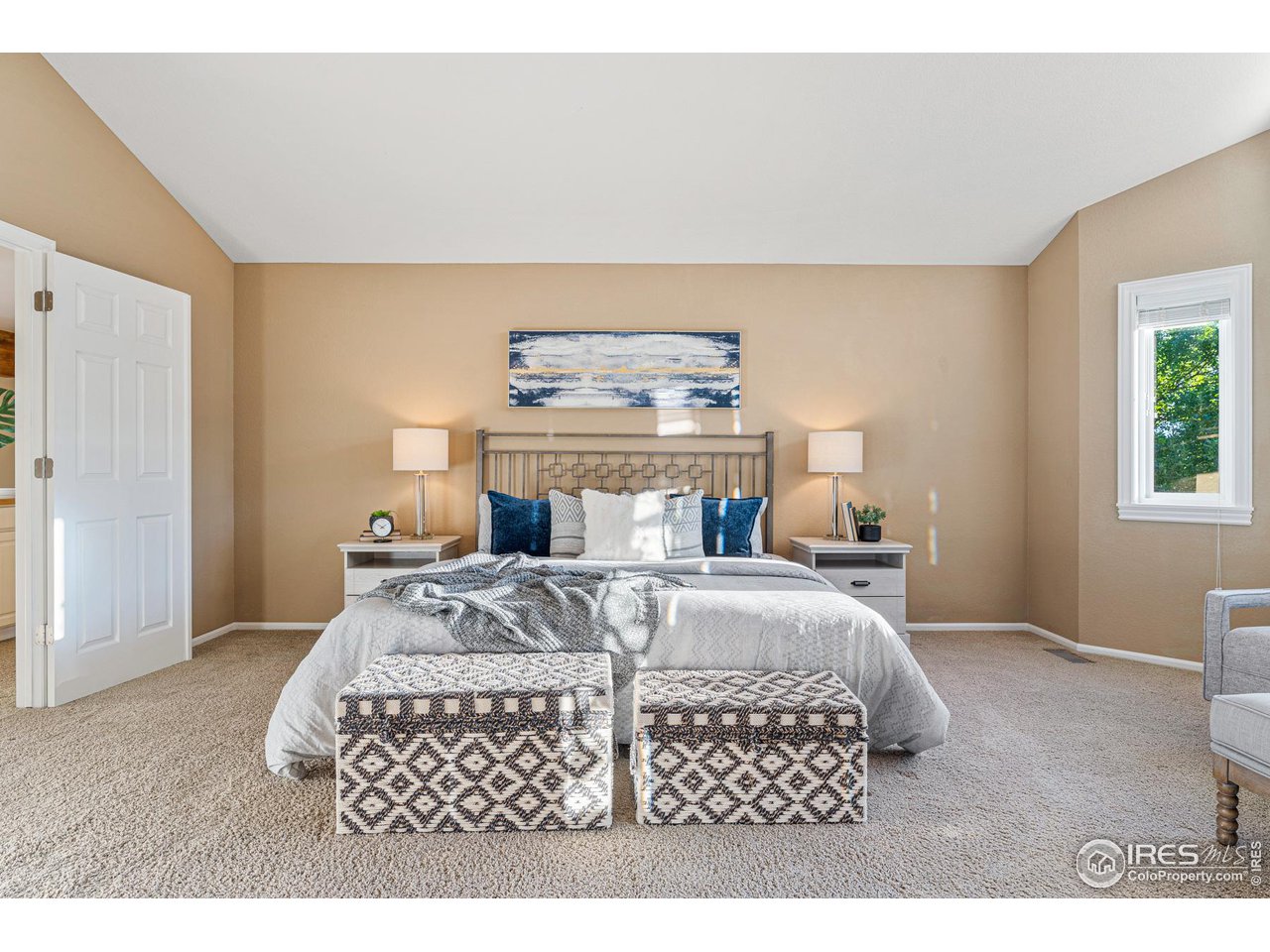 7452 Augusta Drive Boulder, CO 80301 - Photo 22 of 40 a bedroom with a bed and a night stand