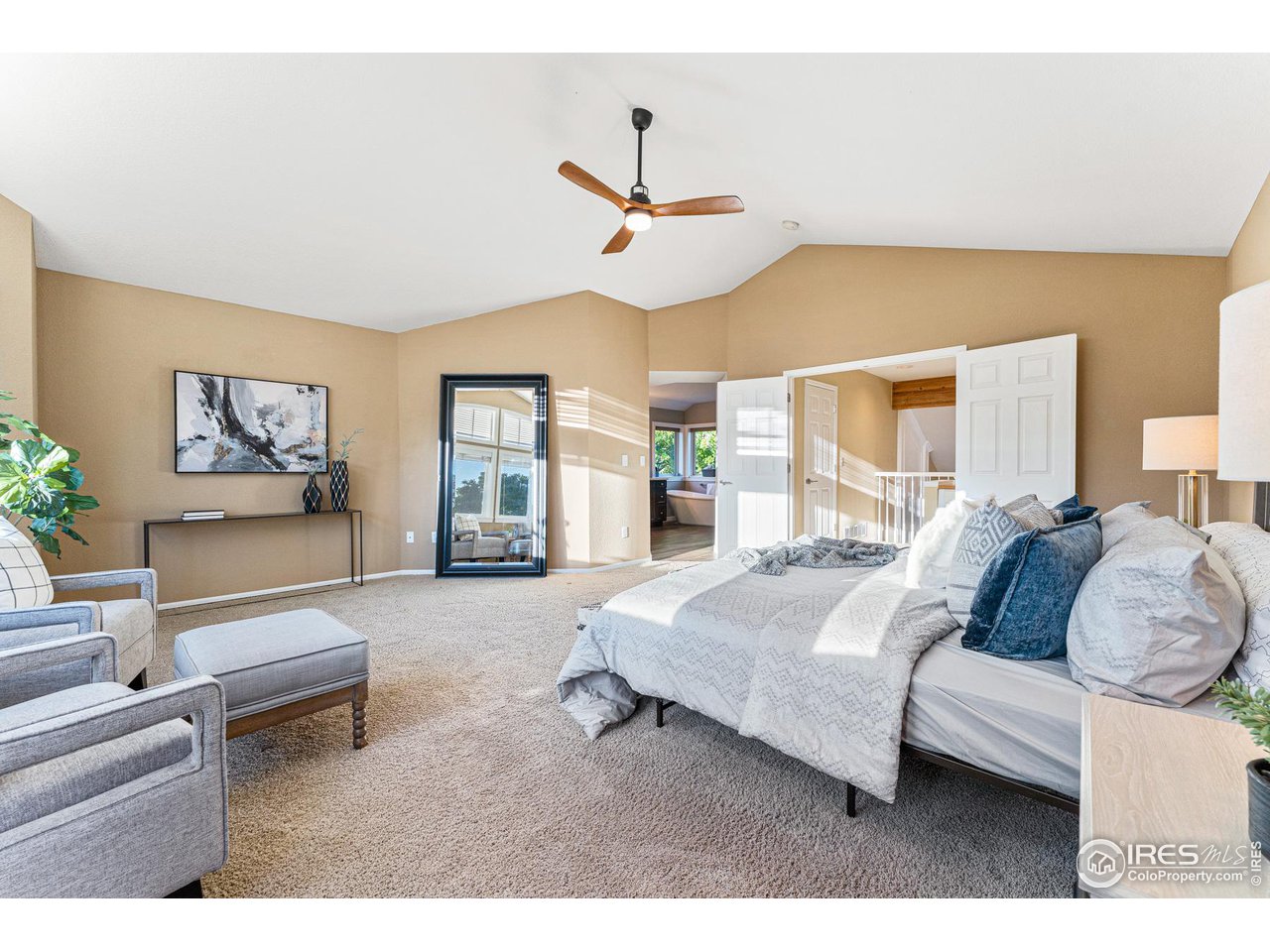 7452 Augusta Drive Boulder, CO 80301 - Photo 23 of 40 a living room with furniture and a large window