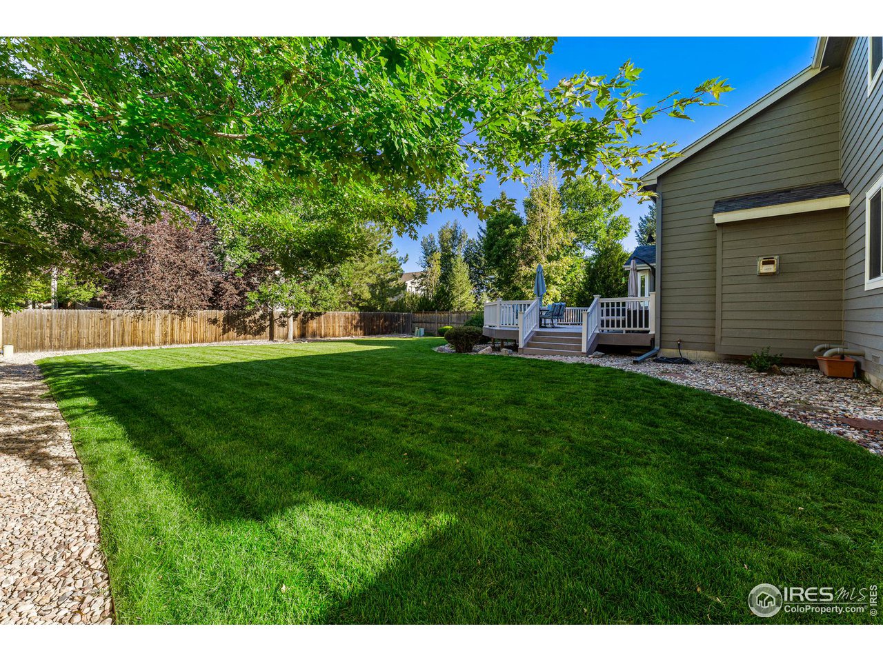 7452 Augusta Drive Boulder, CO 80301 - Photo 35 of 40 a view of a backyard with a garden