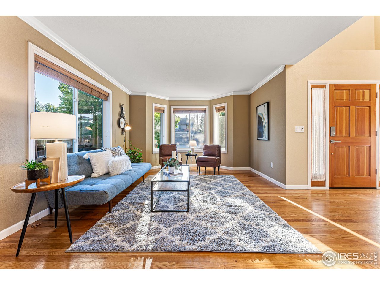 7452 Augusta Drive Boulder, CO 80301 - Photo 6 of 40 a living room with furniture and a large window