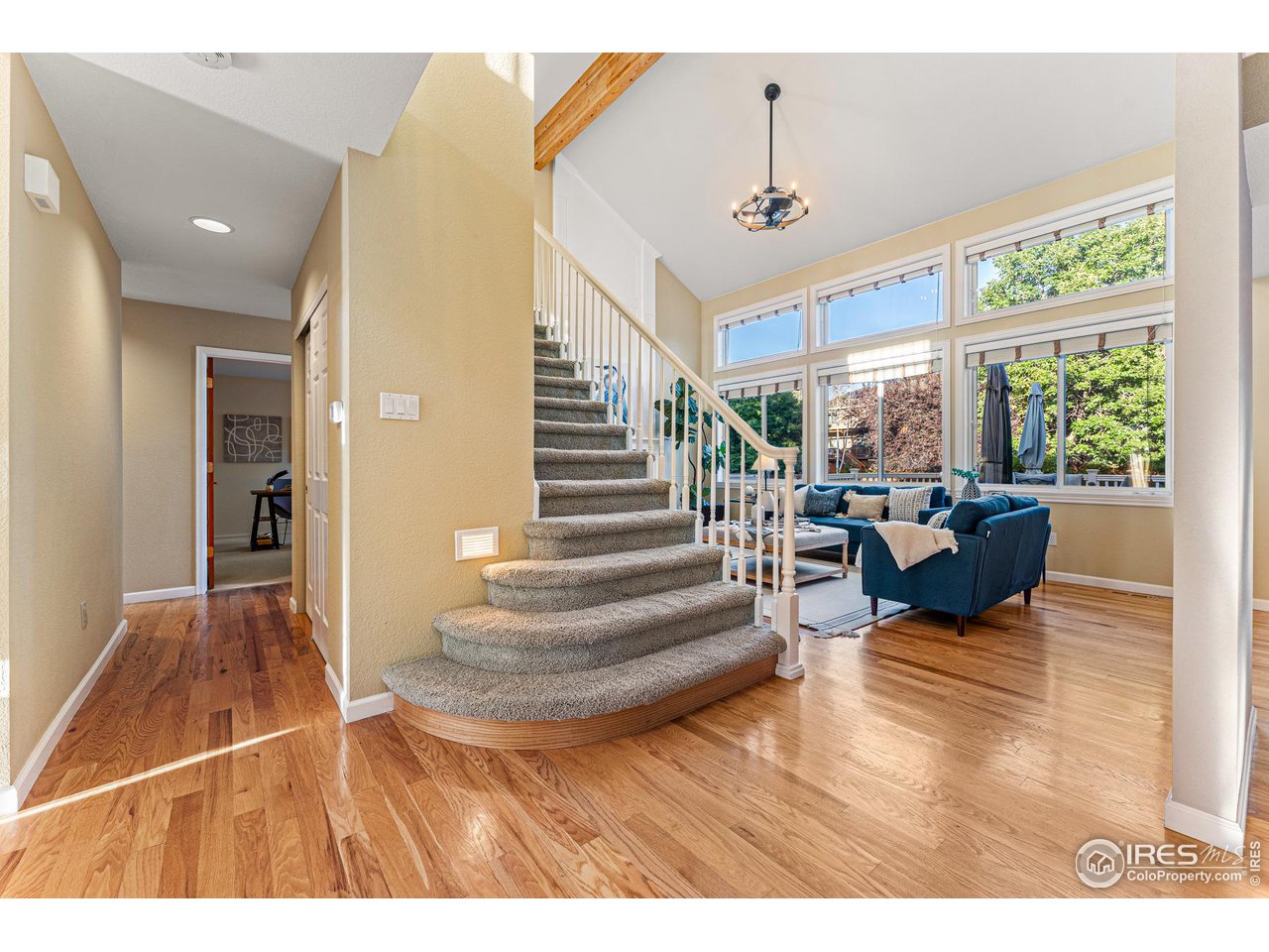 7452 Augusta Drive Boulder, CO 80301 - Photo 9 of 40 a living room with furniture and a large window