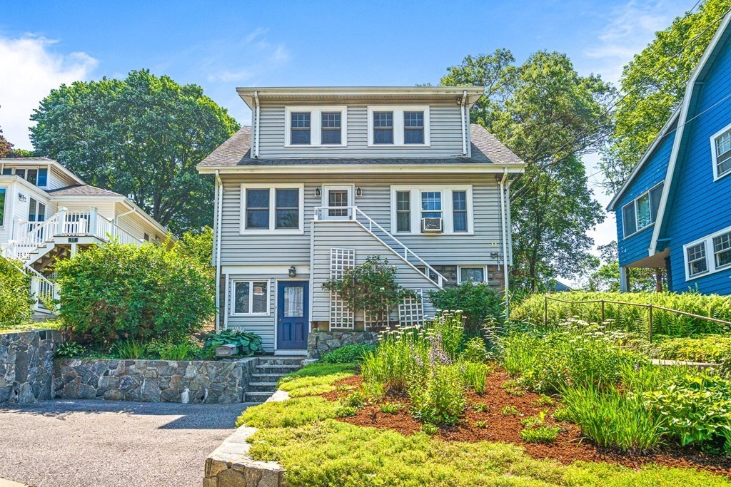 11 Ronald Road Arlington, MA 02474 - Photo 1 of 42 a front view of a house with a yard