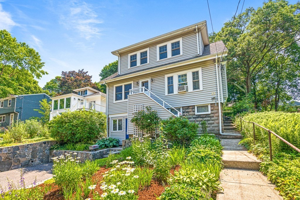 11 Ronald Road Arlington, MA 02474 - Photo 2 of 42 a front view of a house with a yard