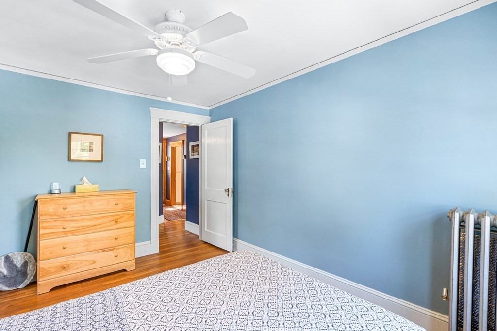 11 Ronald Road Arlington, MA 02474 - Photo 30 of 42 a bedroom with a bed and a dresser