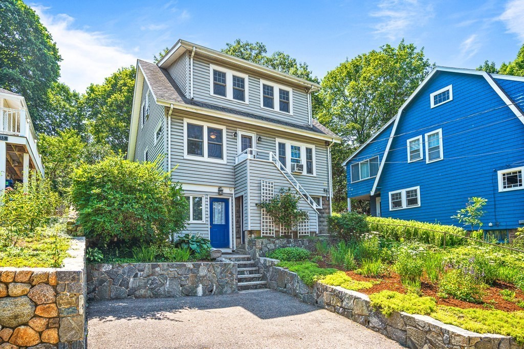 11 Ronald Road Arlington, MA 02474 - Photo 3 of 42 a front view of a house with a yard