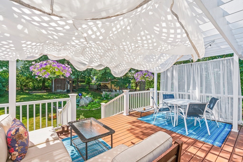 11 Ronald Road Arlington, MA 02474 - Photo 35 of 42 a view of a patio with a table chairs and a table