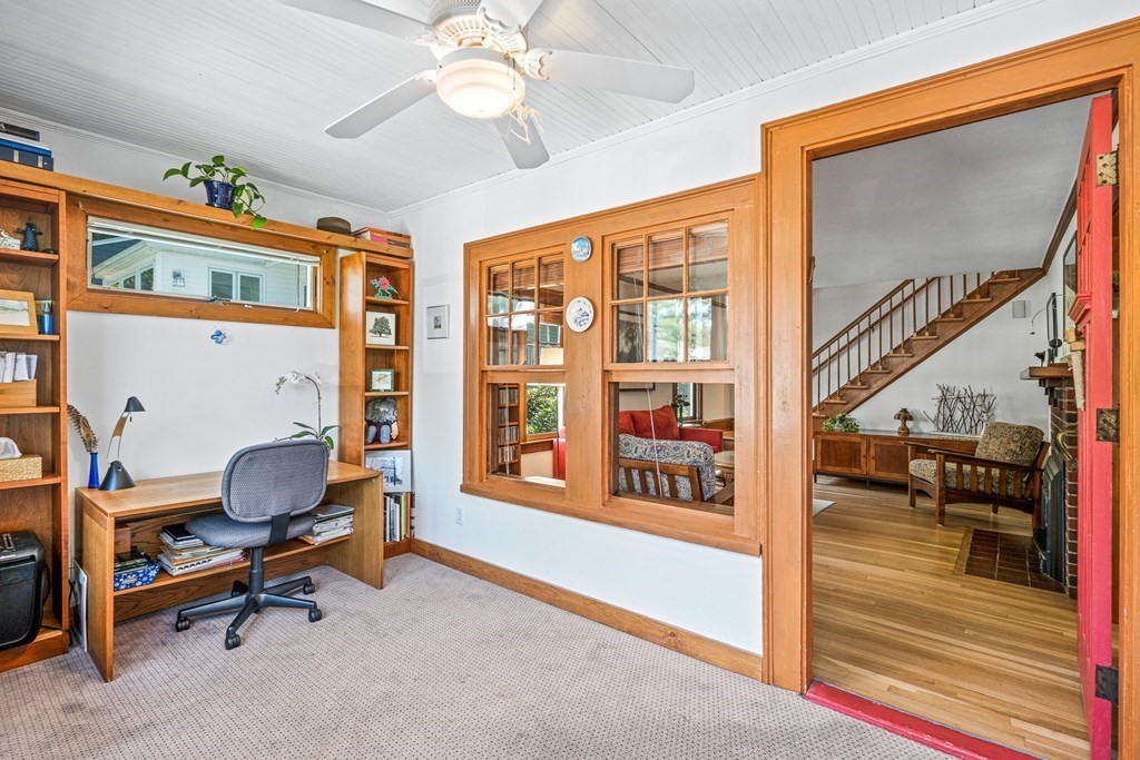 11 Ronald Road Arlington, MA 02474 - Photo 4 of 42 a living room with furniture and a floor to ceiling window