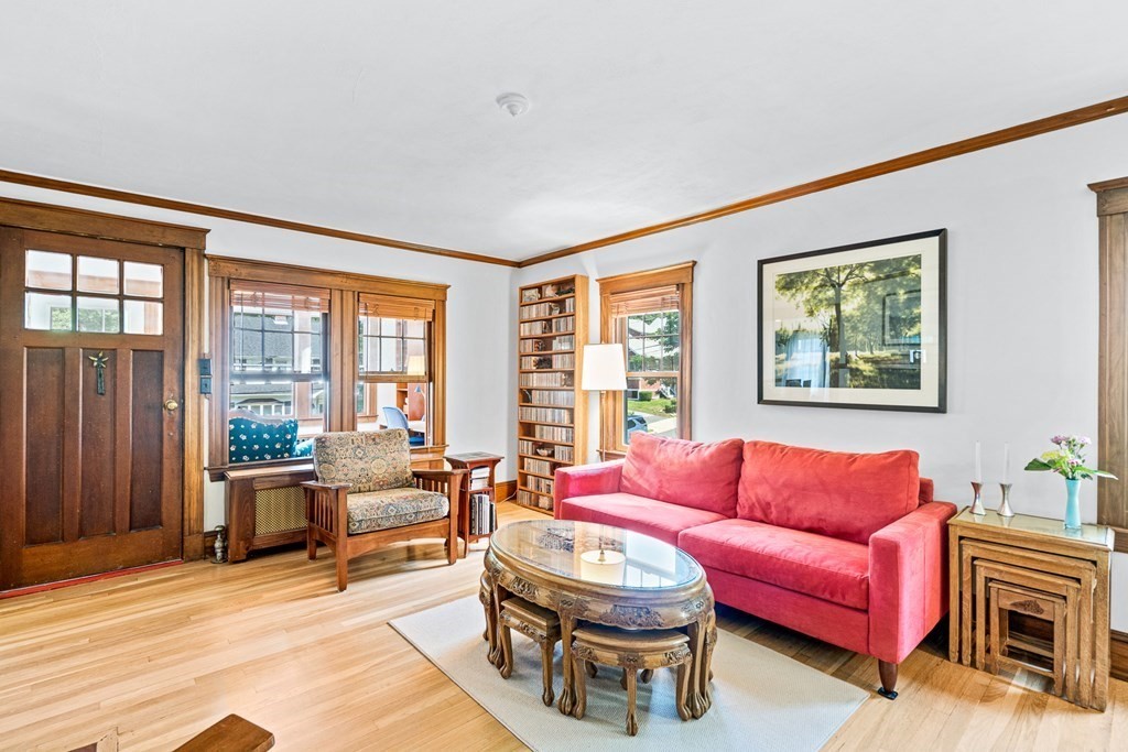 11 Ronald Road Arlington, MA 02474 - Photo 7 of 42 a living room with furniture large window and wooden floor