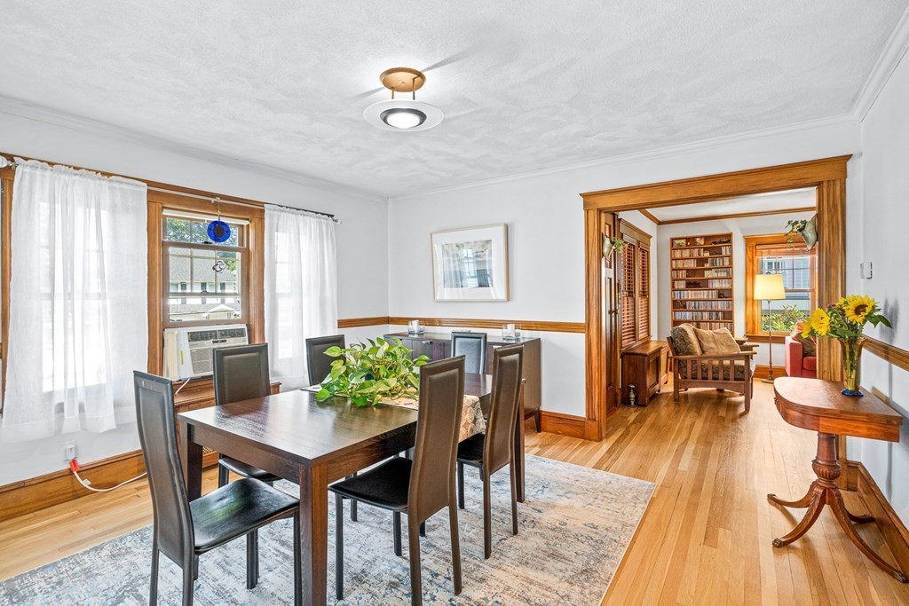 11 Ronald Road Arlington, MA 02474 - Photo 10 of 42 a view of a dining room with furniture and wooden floor