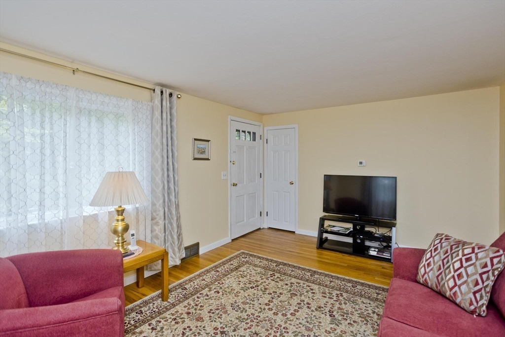 6 North Brook Road Springfield, MA 01119 - Photo 15 of 42 a living room with furniture and a flat screen tv