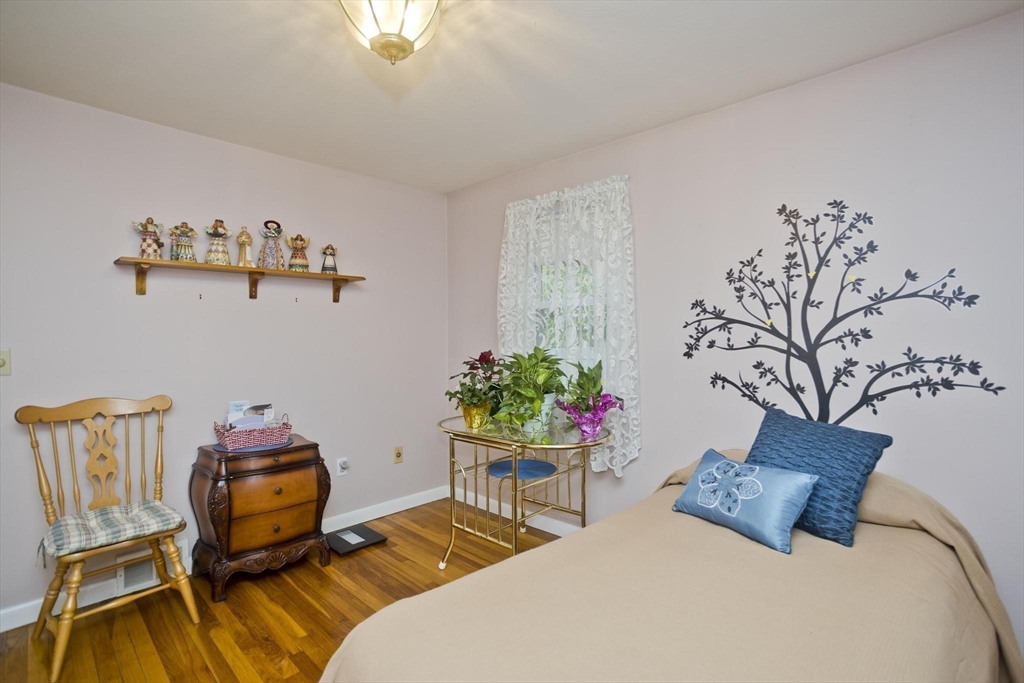 6 North Brook Road Springfield, MA 01119 - Photo 23 of 42 a bedroom with bed and a chair