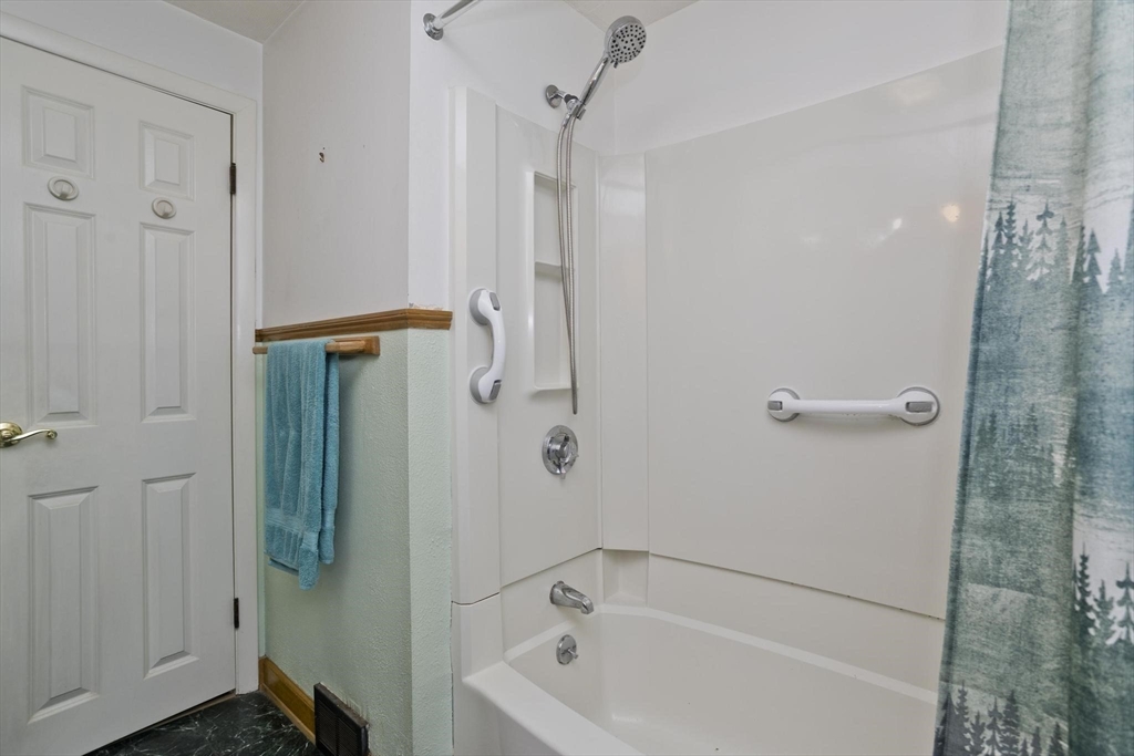 6 North Brook Road Springfield, MA 01119 - Photo 27 of 42 a bathroom with a bath tub with a shower
