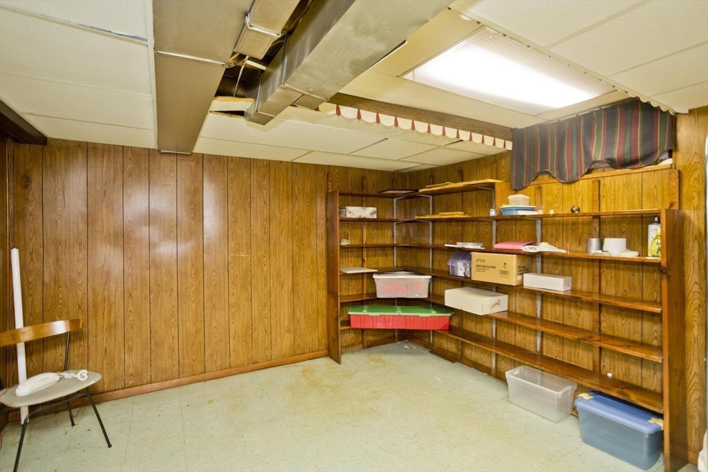 6 North Brook Road Springfield, MA 01119 - Photo 34 of 42 a room with furniture and wooden walls