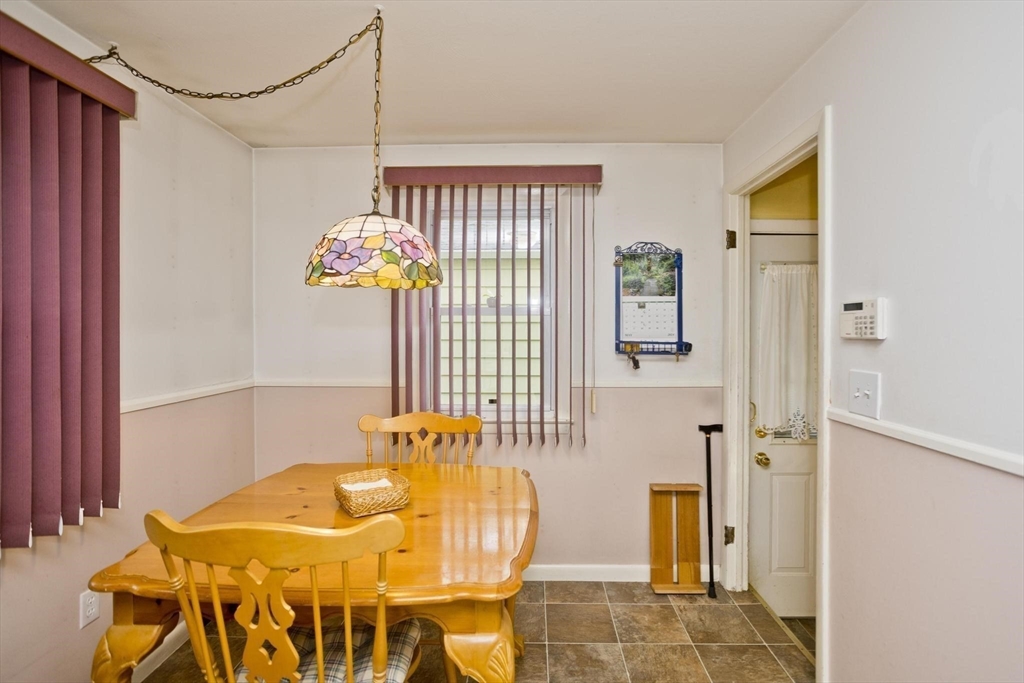 6 North Brook Road Springfield, MA 01119 - Photo 7 of 42 a view of a dining room with furniture and chandelier