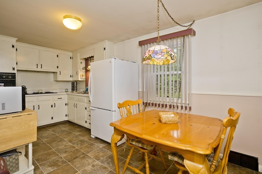 6 North Brook Road Springfield, MA 01119 - Photo 9 of 42 a very nice looking dining room with a table and chairs