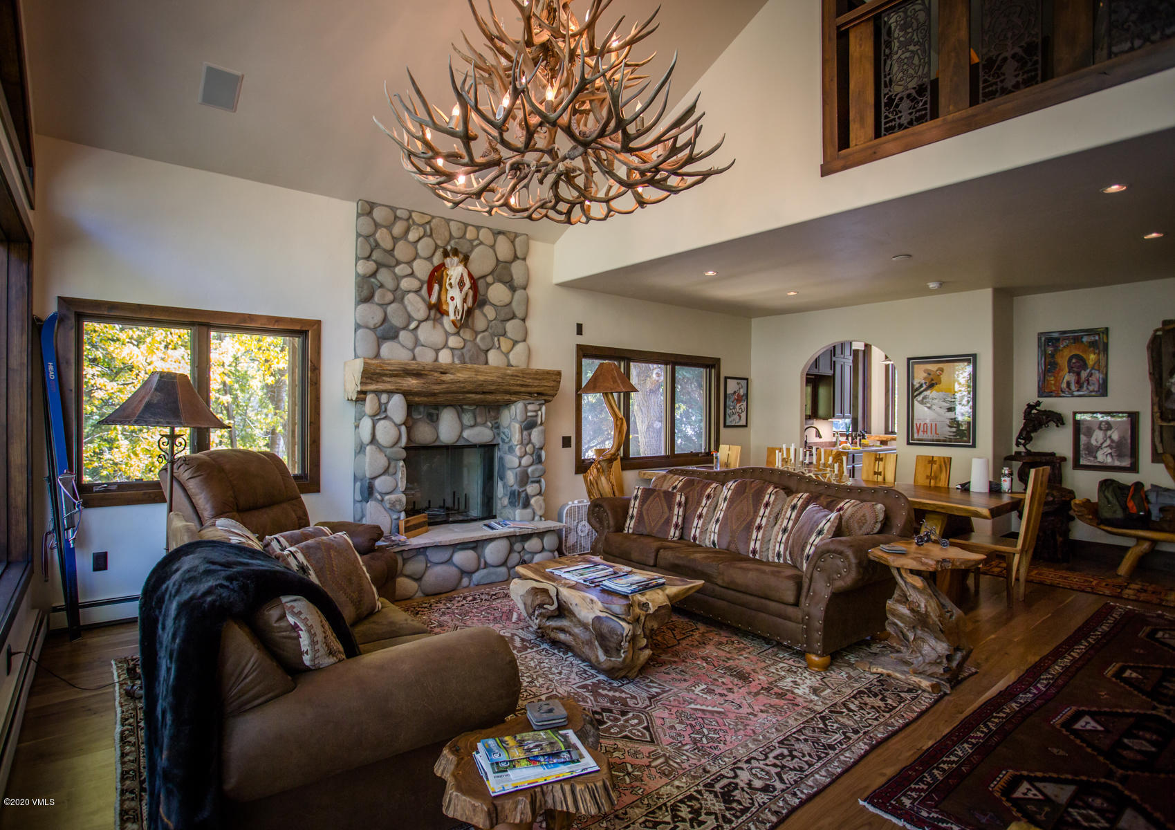 a living room with furniture or couch and a fireplace