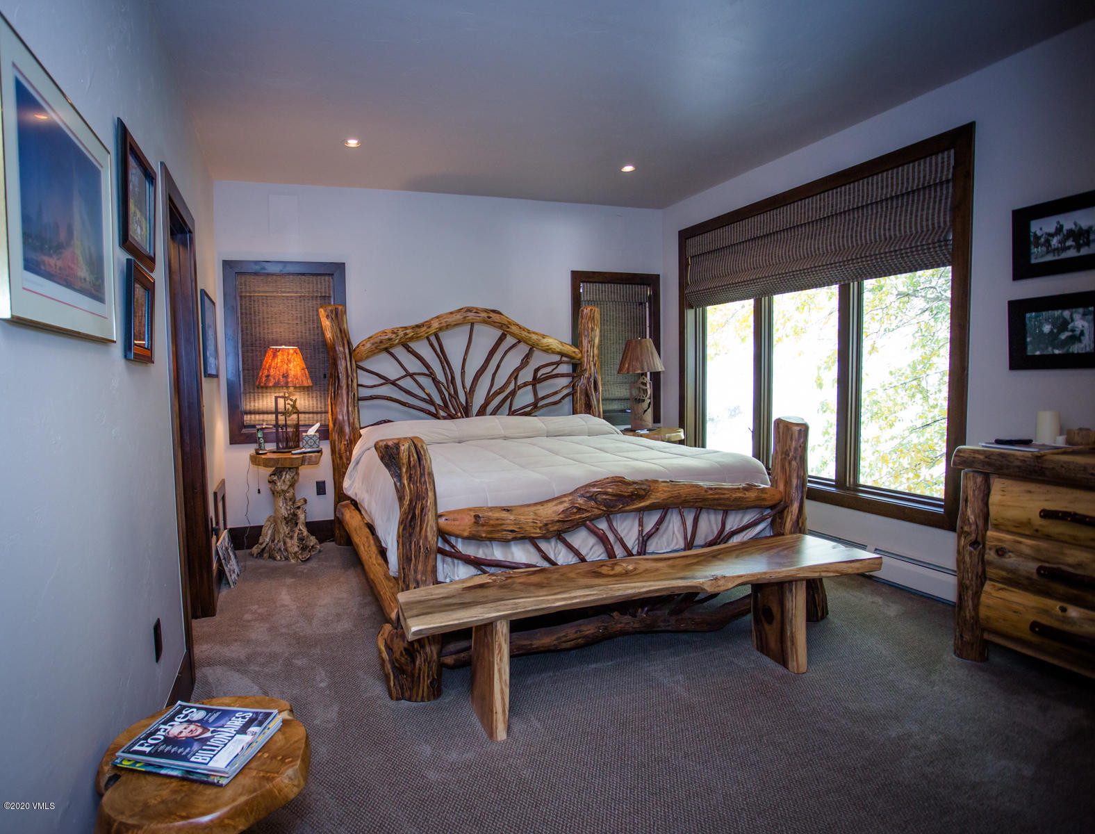 850 Main Street, Unit A Minturn, CO 81645 - Photo 13 of 34 a bedroom with a bed and a window in it