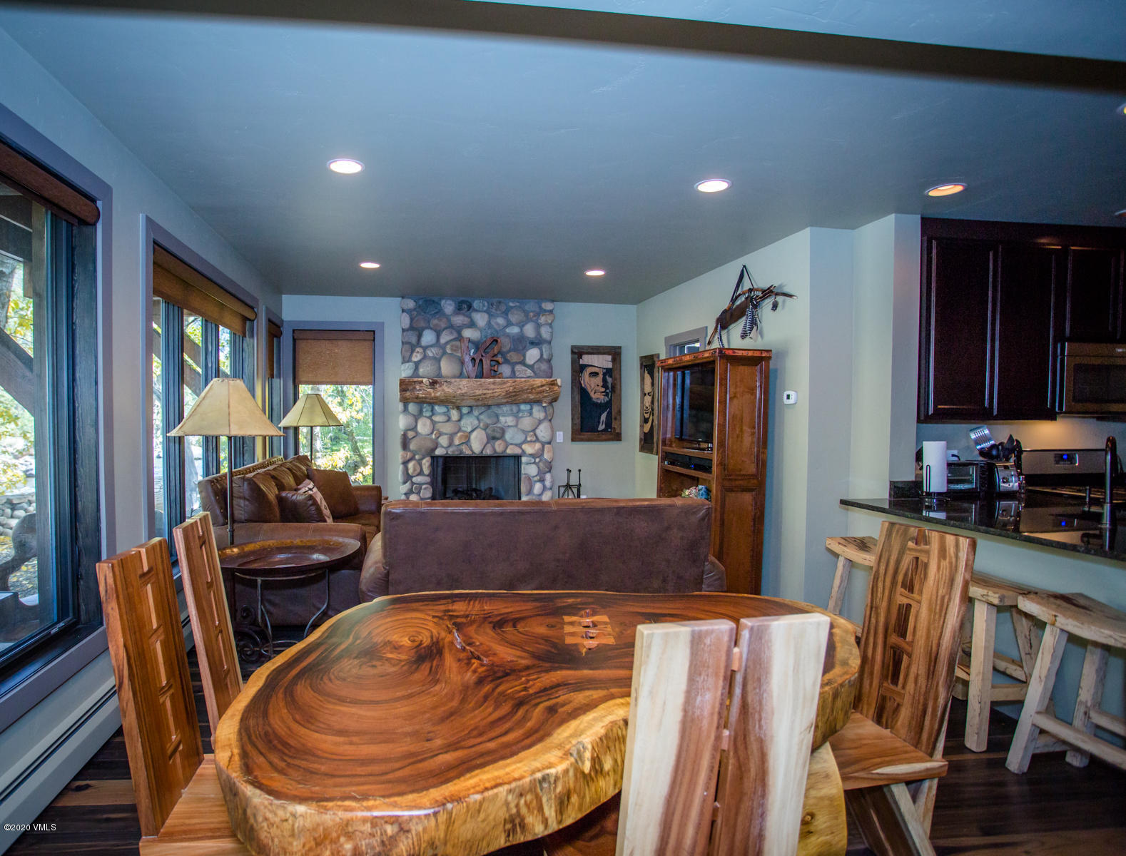 850 Main Street, Unit A Minturn, CO 81645 - Photo 20 of 34 a living room with furniture and a fireplace