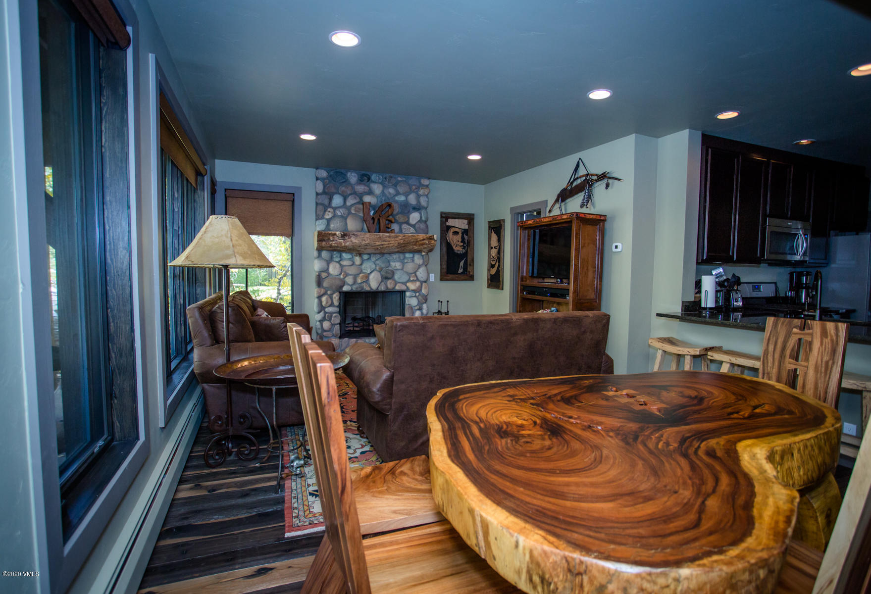 850 Main Street, Unit A Minturn, CO 81645 - Photo 21 of 34 a living room with furniture and a fireplace