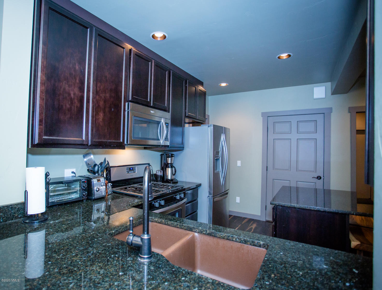 850 Main Street, Unit A Minturn, CO 81645 - Photo 25 of 34 a room with furniture a rug and a window