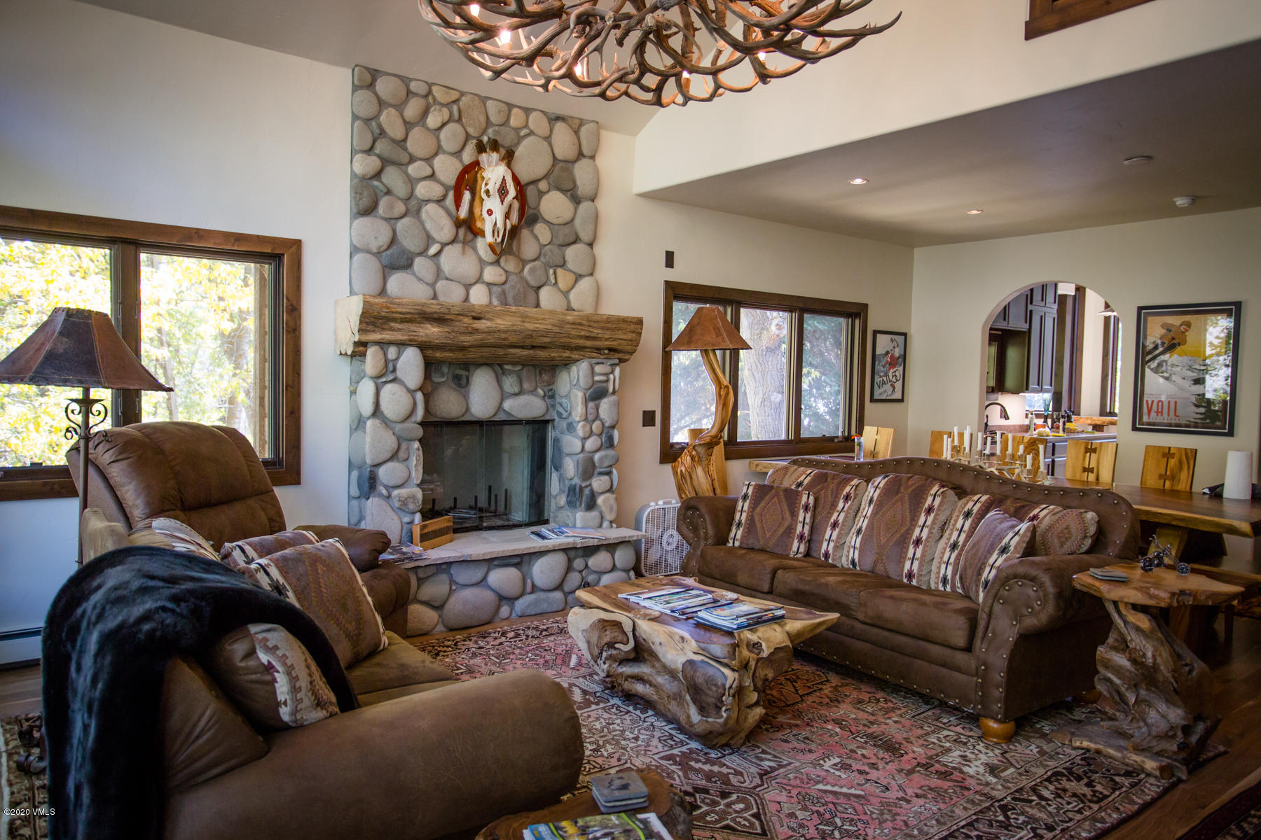 850 Main Street, Unit A Minturn, CO 81645 - Photo 4 of 34 a living room with furniture and a fireplace
