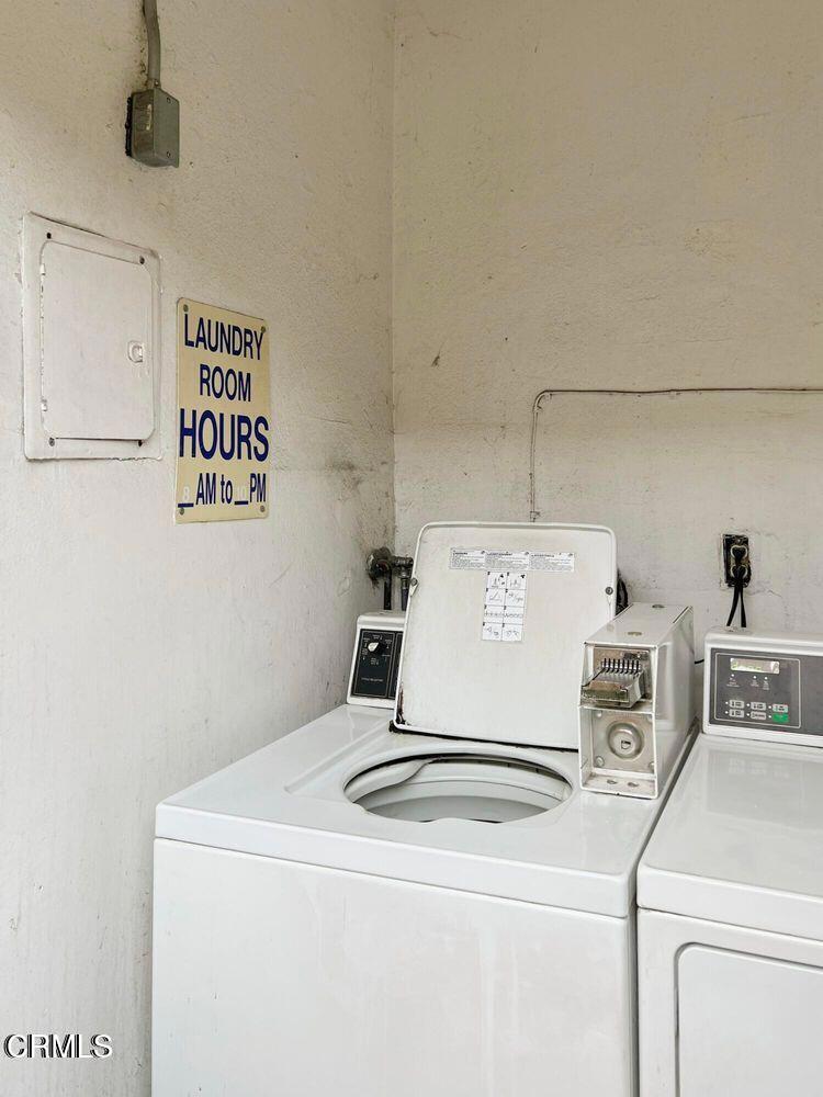 318 Laveta Terrace, Unit 4 Los Angeles, CA 90026 - Photo 12 of 14 a utility room with dryer and washer
