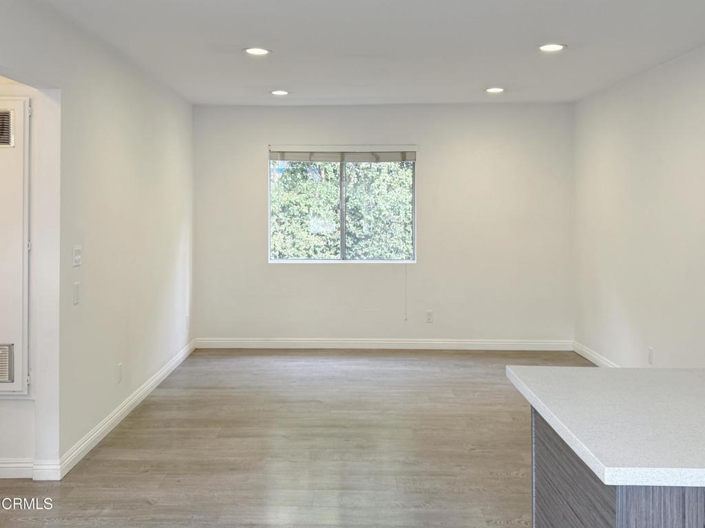 318 Laveta Terrace, Unit 4 Los Angeles, CA 90026 - Photo 3 of 14 an empty room with windows