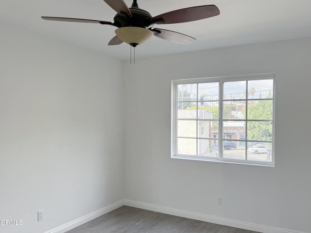 318 Laveta Terrace, Unit 4 Los Angeles, CA 90026 - Photo 5 of 14 an empty room with a window