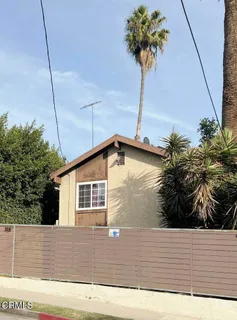 a house view with a garden space
