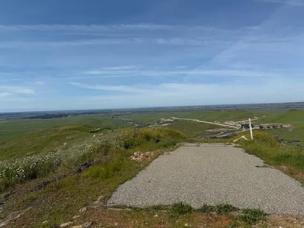 a view of an ocean with beach and ocean