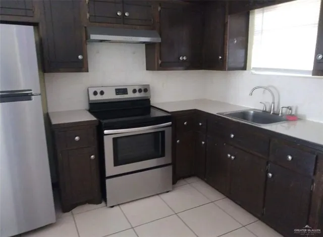 a bathroom with a shower and a toilet