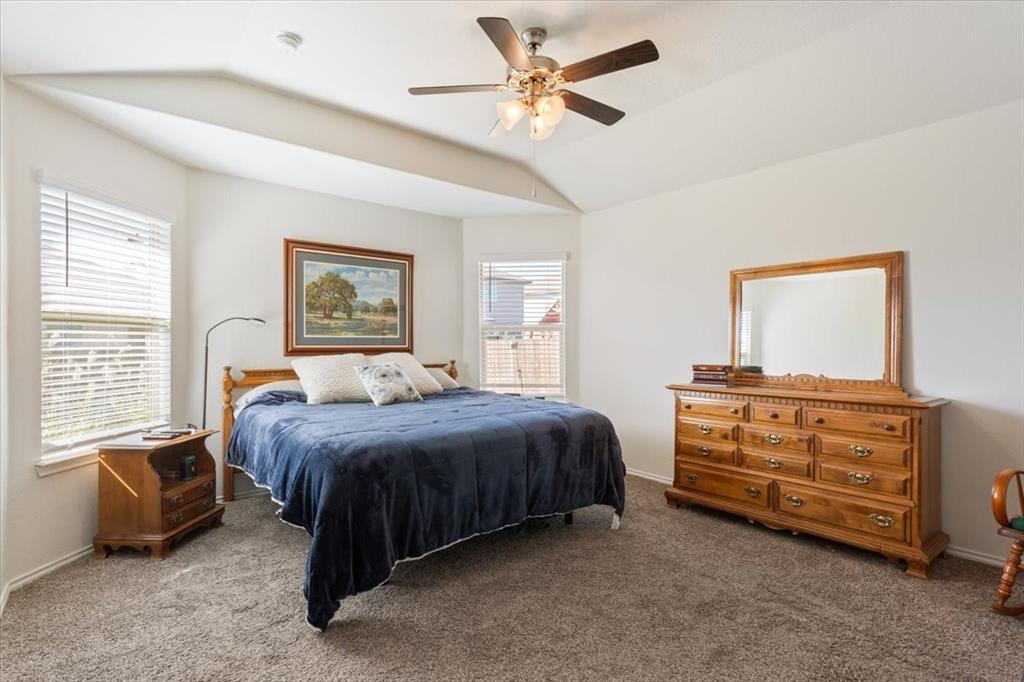 11204 Echo Drive Waco, TX 76708 - Photo 15 of 27 a spacious bedroom with a bed and a dresser