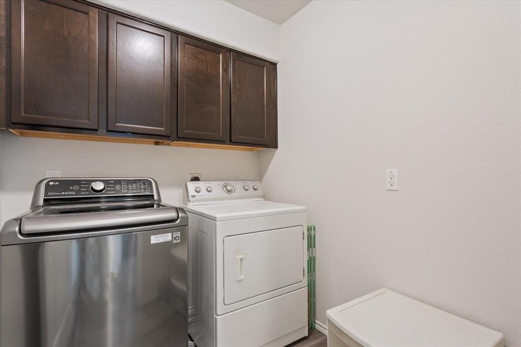 11204 Echo Drive Waco, TX 76708 - Photo 22 of 27 a utility room with dryer and washer