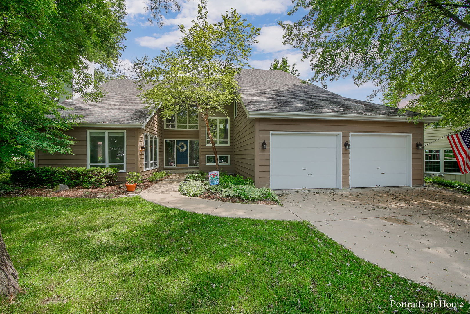 1S781 Carrol Gate Road Wheaton, IL 60189 - Photo 1 of 30 a front view of house with yard and trees