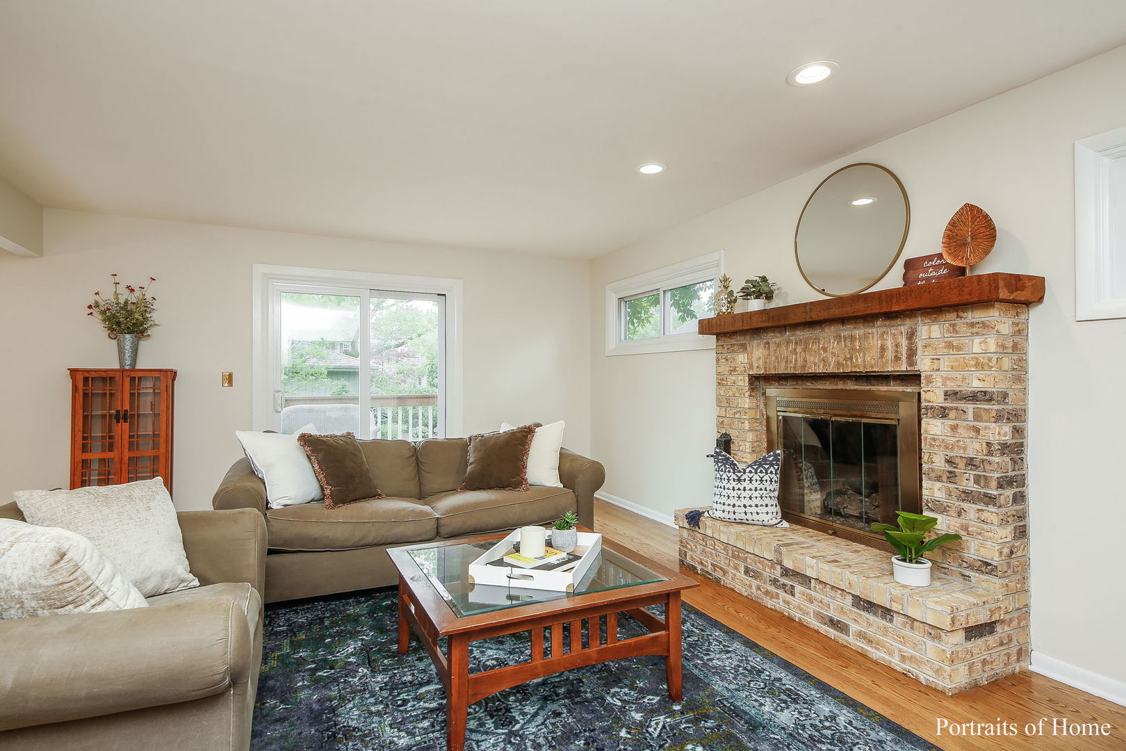 1S781 Carrol Gate Road Wheaton, IL 60189 - Photo 14 of 30 a living room with furniture and a fireplace
