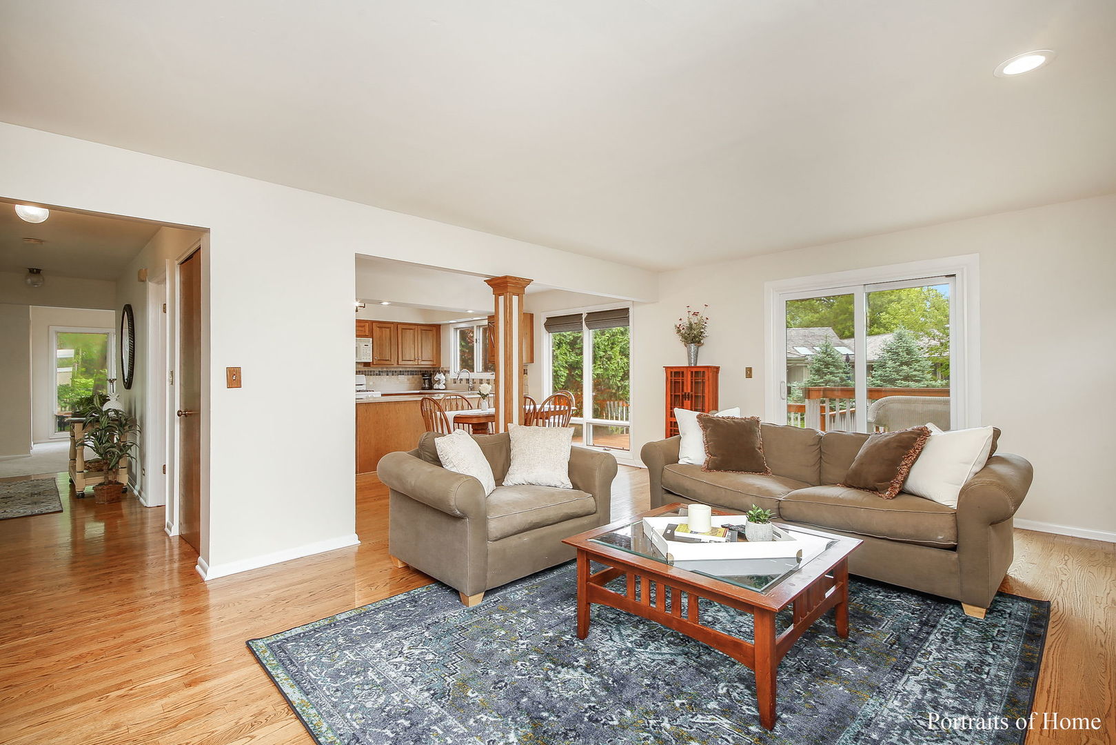 1S781 Carrol Gate Road Wheaton, IL 60189 - Photo 15 of 30 a living room with furniture and a rug