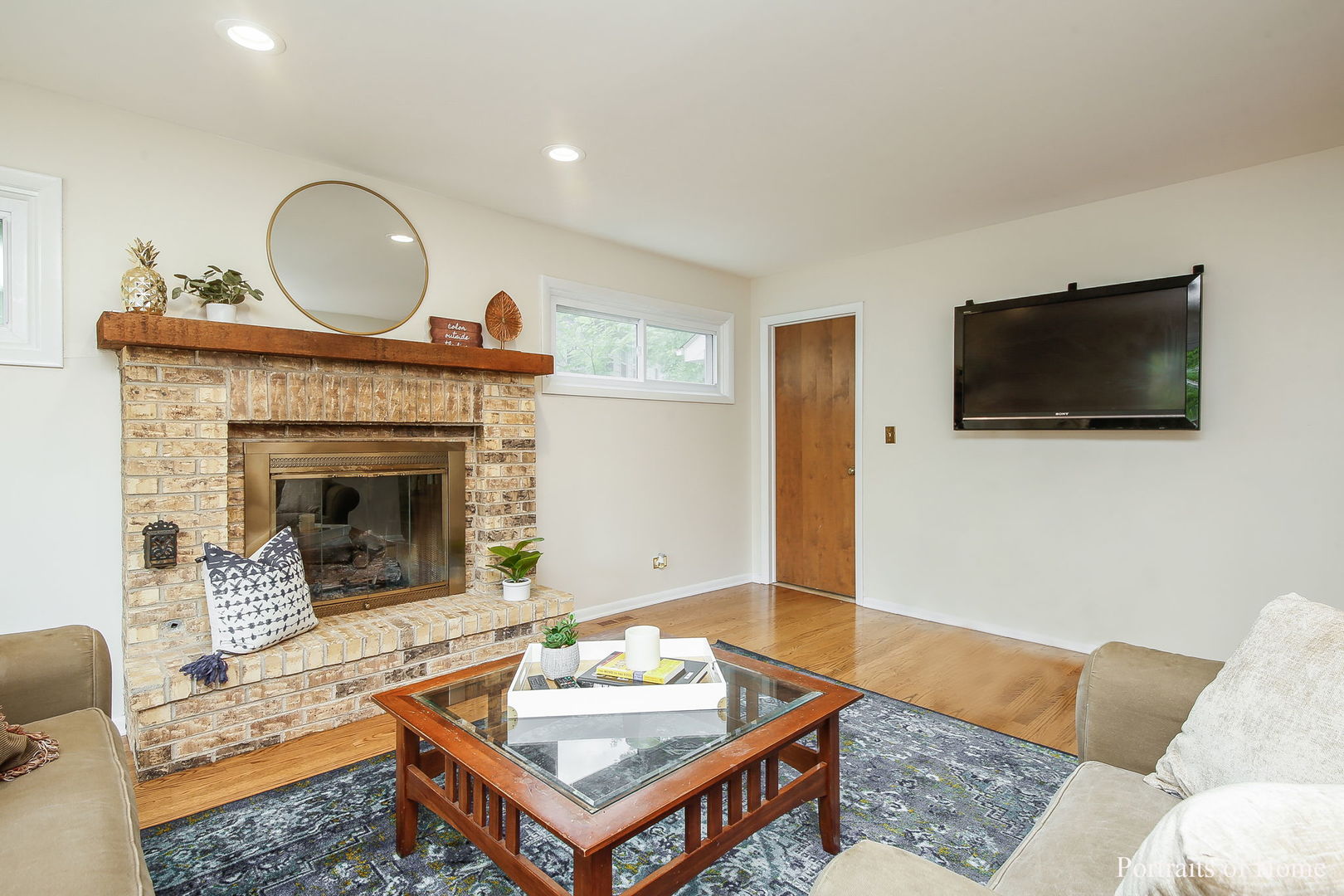 1S781 Carrol Gate Road Wheaton, IL 60189 - Photo 16 of 30 a living room with furniture and a fireplace