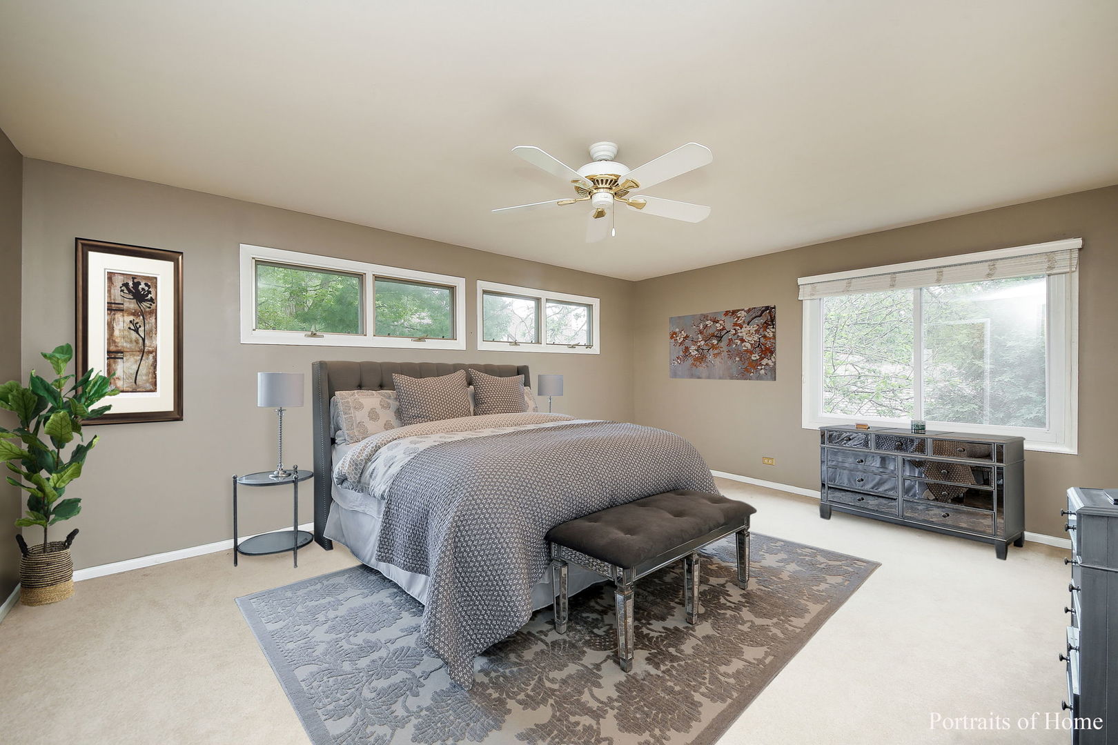 1S781 Carrol Gate Road Wheaton, IL 60189 - Photo 19 of 30 a spacious bedroom with a bed a table and chair