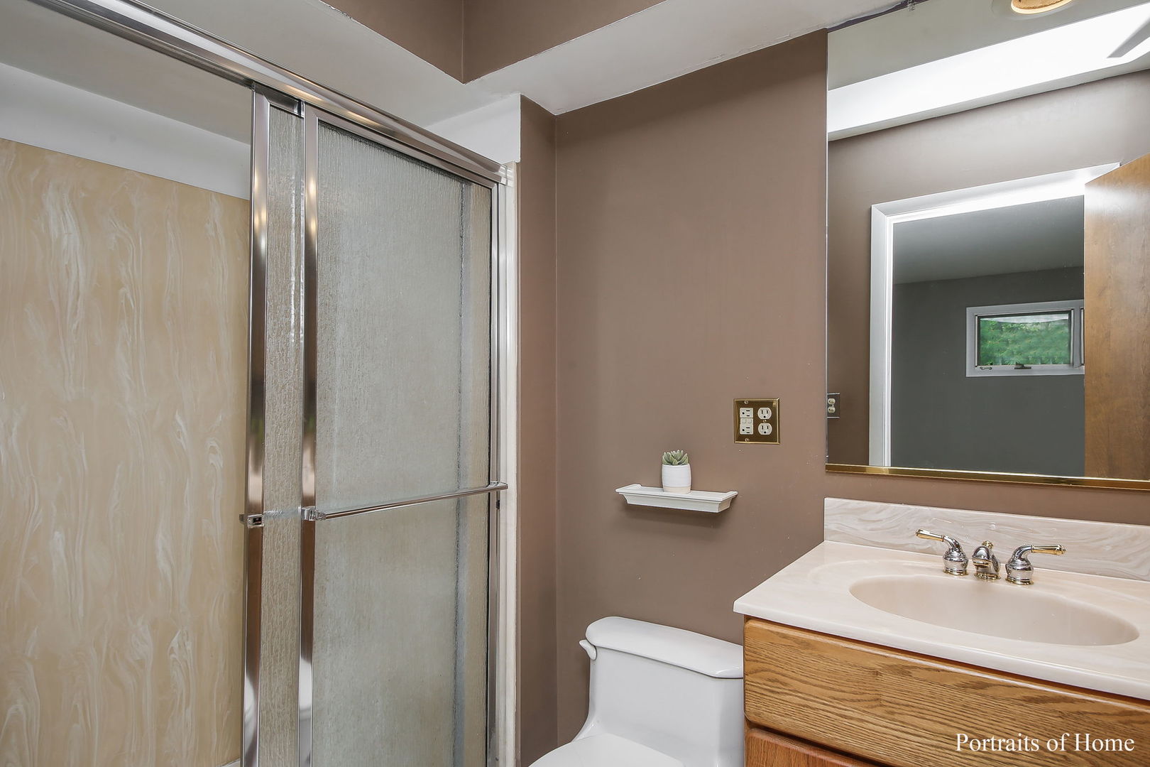 1S781 Carrol Gate Road Wheaton, IL 60189 - Photo 24 of 30 a bathroom with a sink toilet and shower