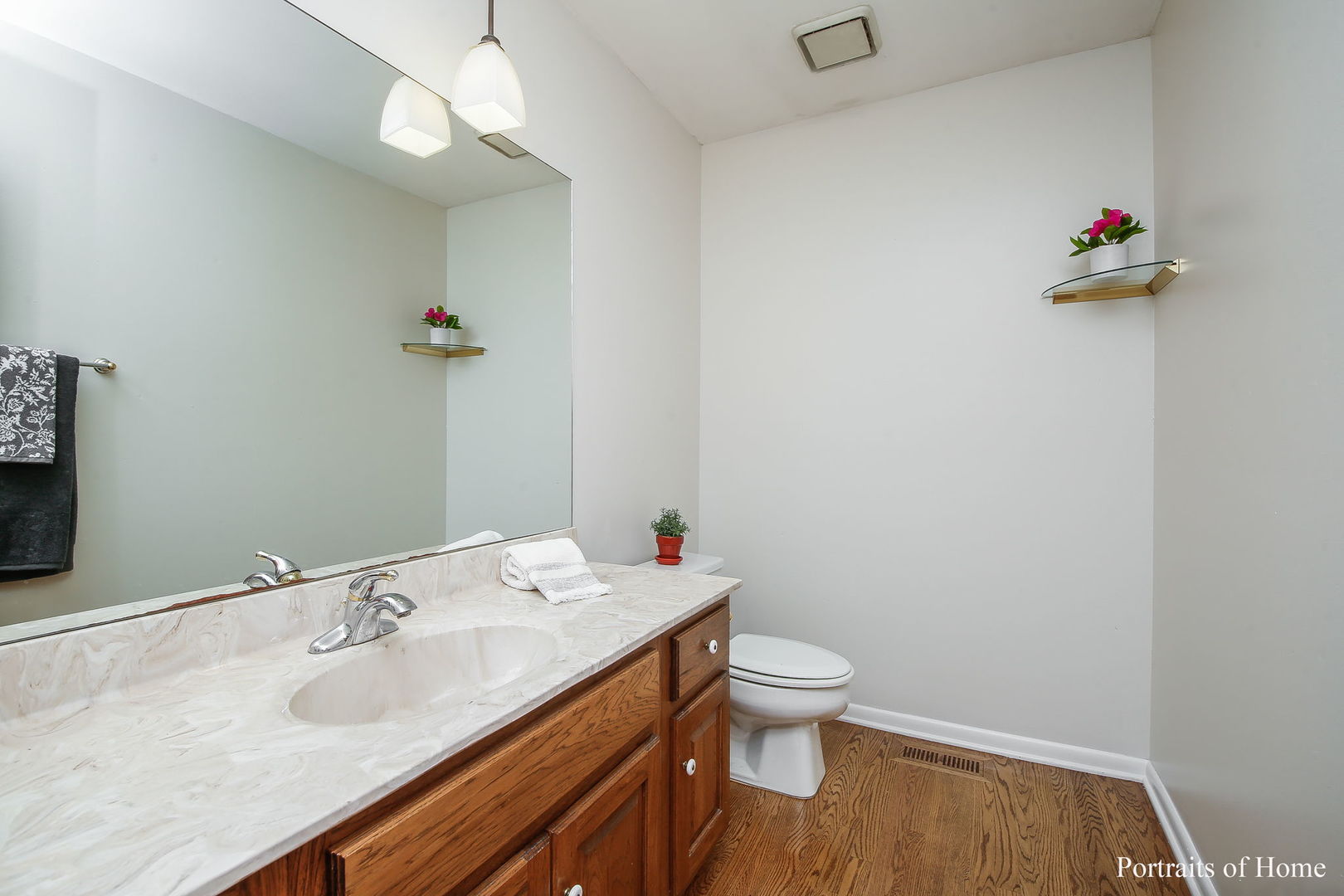 1S781 Carrol Gate Road Wheaton, IL 60189 - Photo 28 of 30 a bathroom with a sink toilet and a mirror
