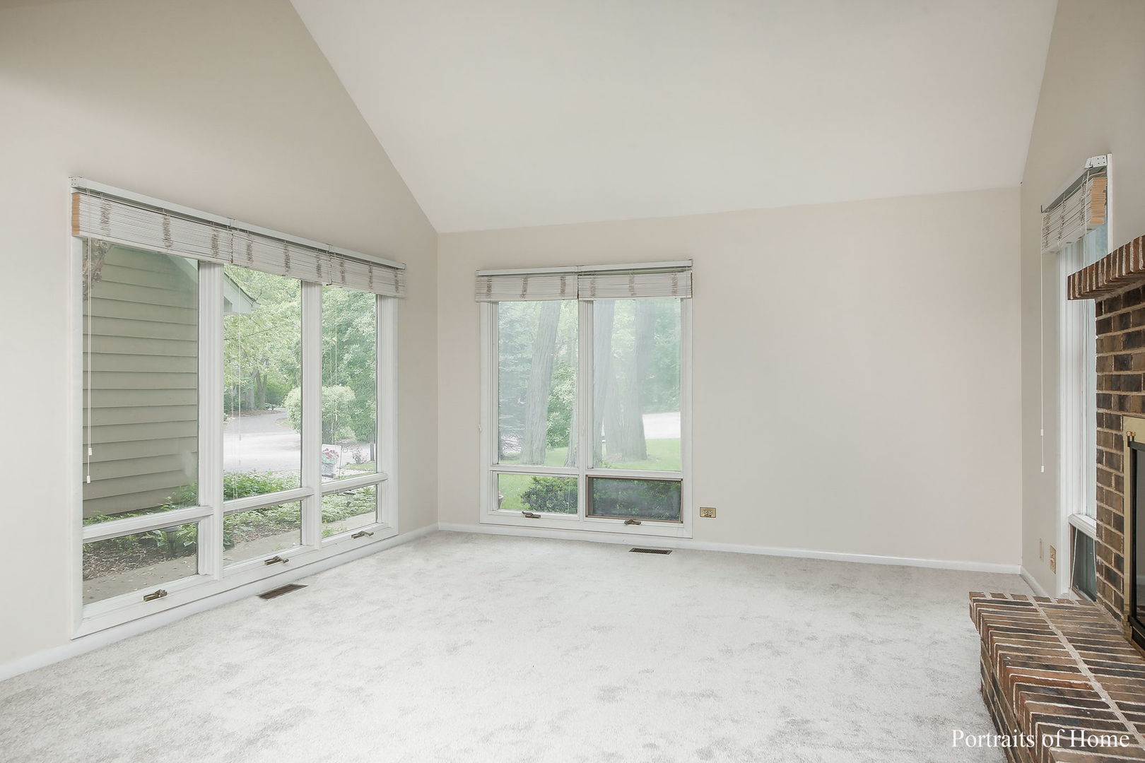 1S781 Carrol Gate Road Wheaton, IL 60189 - Photo 5 of 30 a view of an empty room with wooden floor and a window
