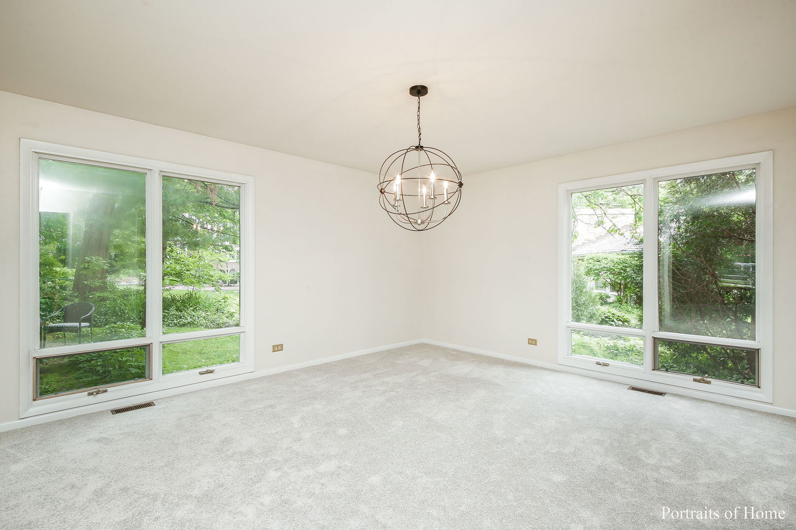 1S781 Carrol Gate Road Wheaton, IL 60189 - Photo 8 of 30 a view of empty room with wooden floor and fan
