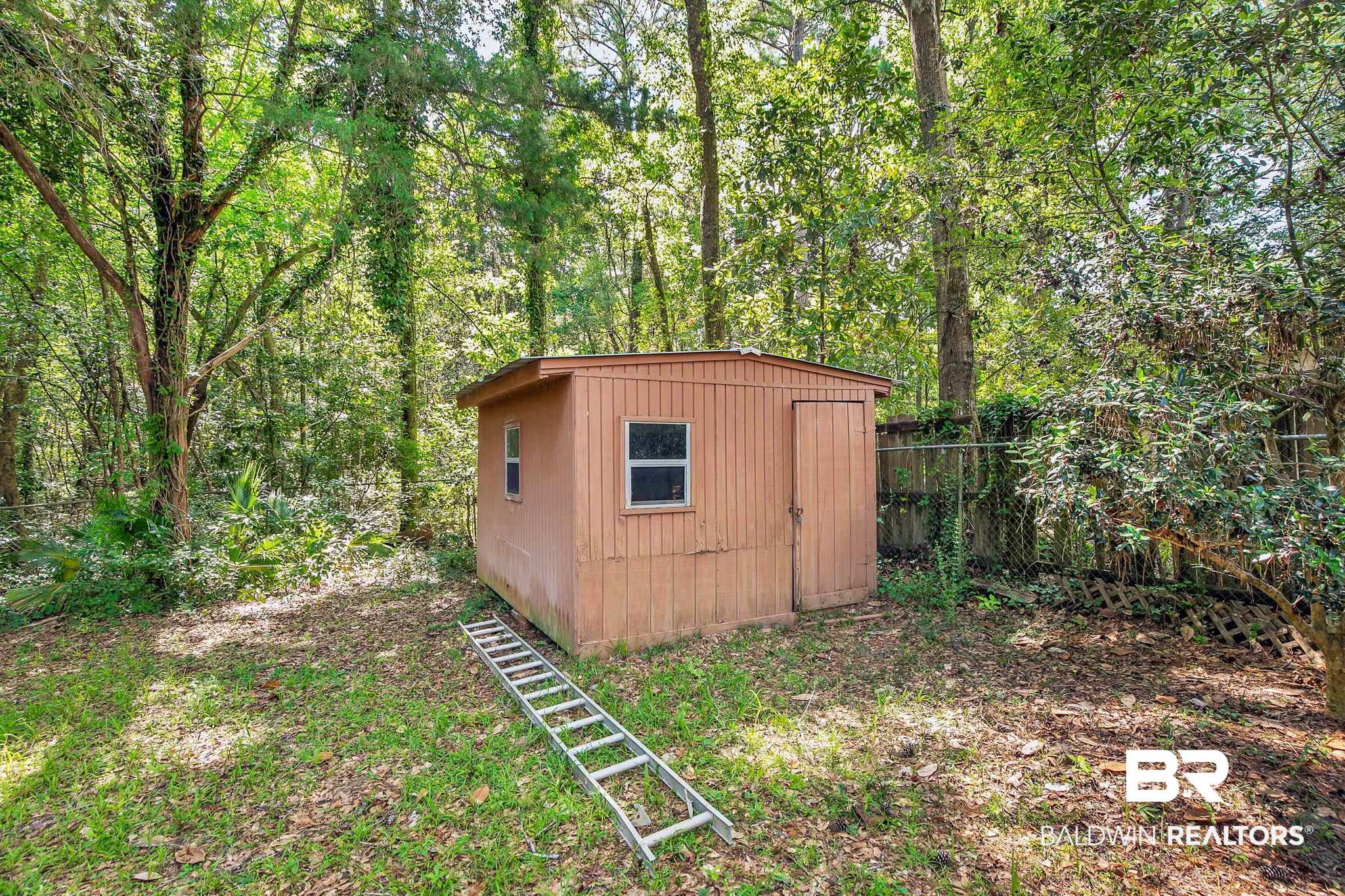 3304 Armond Drive Mobile, AL 36605 - Photo 52 of 62 View of shed featuring a wooded view