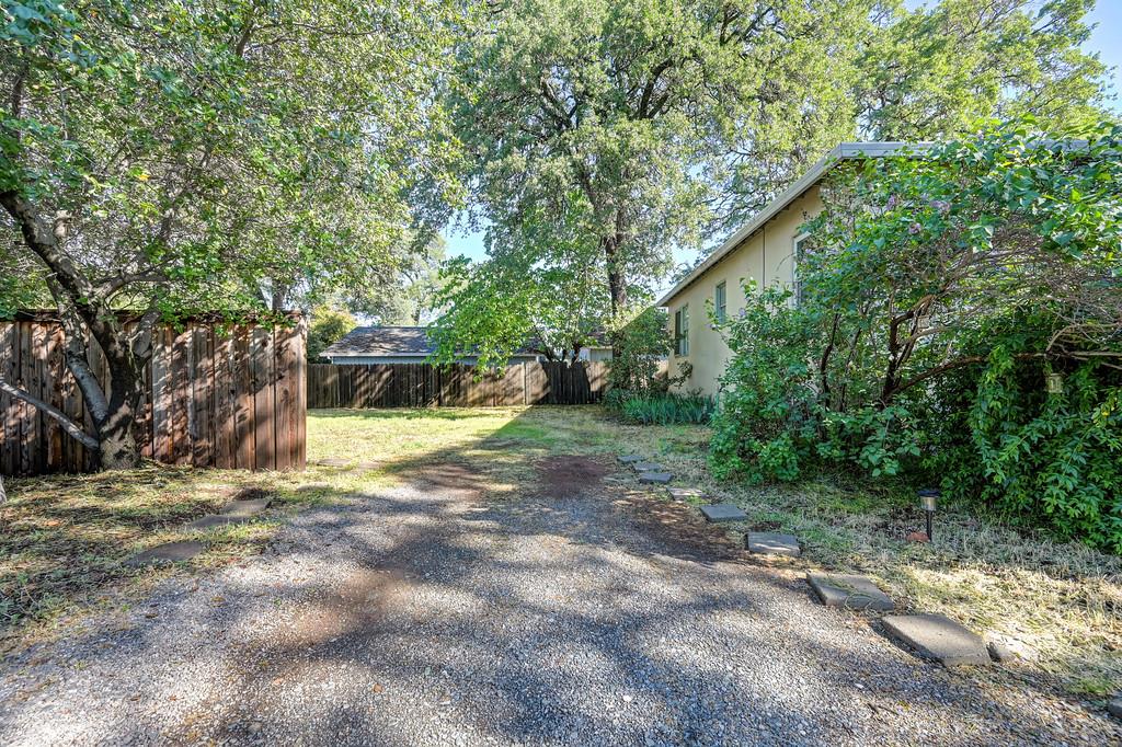 12365 Reba Road Auburn, CA 95603 - Photo 57 of 62 a view of a house with large trees