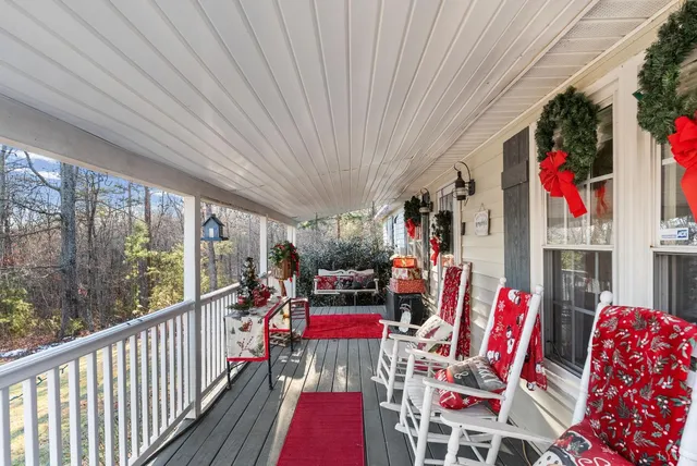 a view of living room filled with furniture and furniture